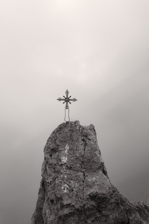 Cross on a cliff B Wの写真素材
