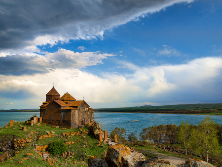 Hayravank monastery on the cliff rocks of Sevan lake in Armeniaの写真素材