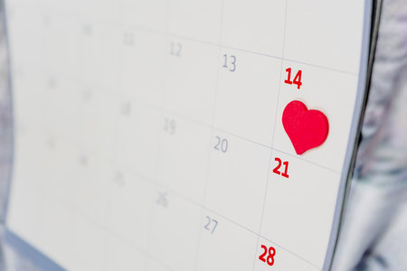 2021 calendar with February 14 marked with a red heart.の写真素材
