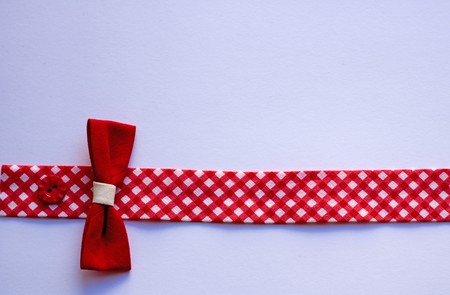 red cotton tape with bow - horizontalの写真素材