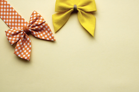 Decorative bows on paper as a background