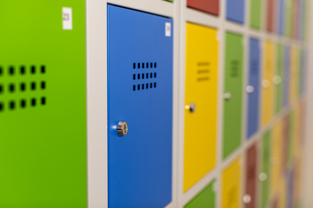 School lockers in green, blue, yellow and red color.の写真素材