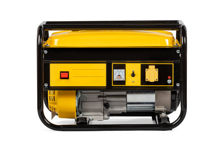 Yellow and black portable electric gas generator isolated on white for backup energy.