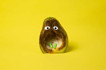 Social problem drug addiction, rotten avocado, pillsの写真素材