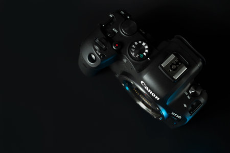 Canon r6 digital camera close-up, black background, glareのeditorial素材