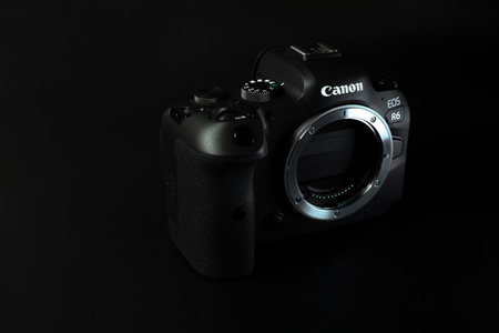 Canon r6 digital camera close-up, black background, glareのeditorial素材