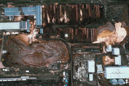 Deforestation of Russia, environmental problems, sawdust, dirt, drone flight