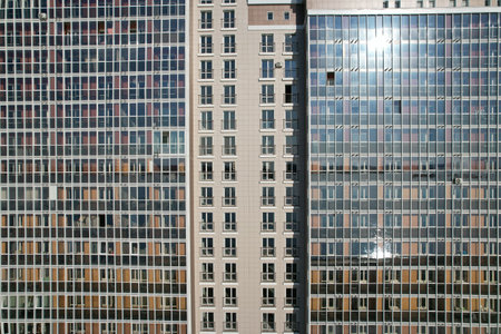 high-rise building - a fire brigade extinguishes a fire in a new skyscraper