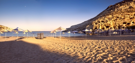 Matala beach at sunrise in Crete, Greece の写真素材