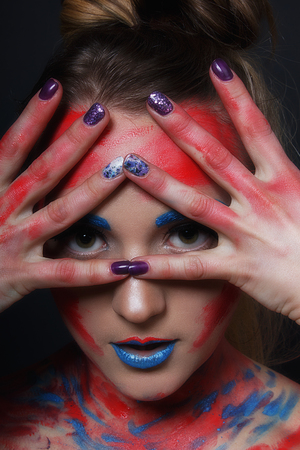 Fashion model girl portrait with colorful make upの写真素材