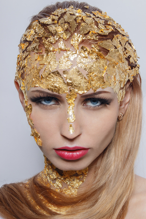Fashion model girl portrait with colorful make upの写真素材