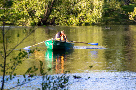 Russia, St. Petersburg-September 21, 2020: Photo of a boat with people swimming on the riverのeditorial素材