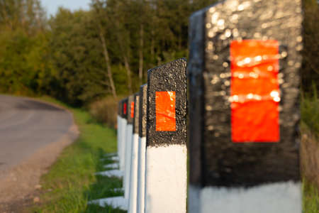 Photo of fences by the road. Safety signsの写真素材