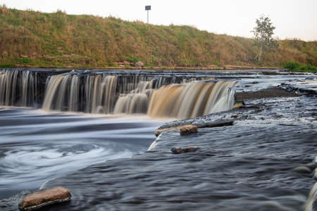 Tosna Falls in Russia. A small waterfall on a long exposure. Beautiful landscapeの写真素材