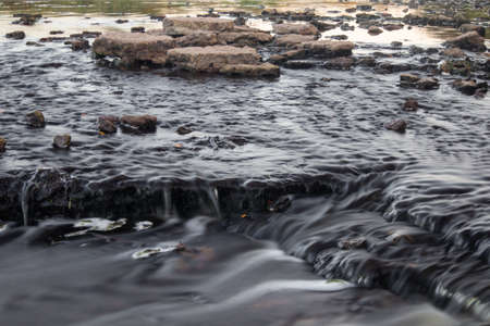 A photo of the water on a long exposure. River in Russia