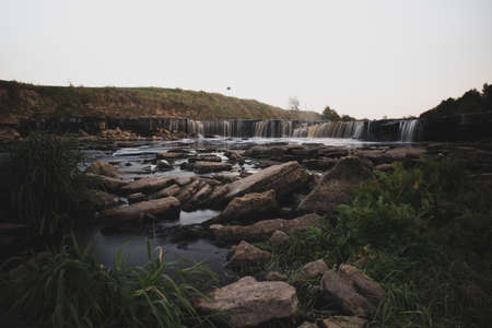 A photo of a small river in Russia, taken on a long exposure. Stone Shore. Beautiful landscapeの写真素材