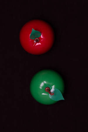 Red and green apple on a dark backgroundの写真素材