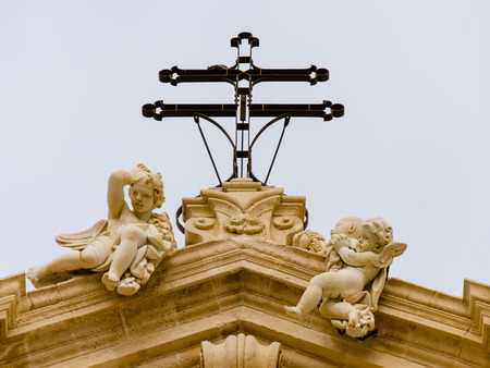 The Cathedral of Syracuse, detail of the pediment with angels, Sicily,の写真素材