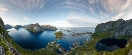 Panorama of the famous Reine fishing village, Lofoten, Norway. Shot from a normally inaccessible...