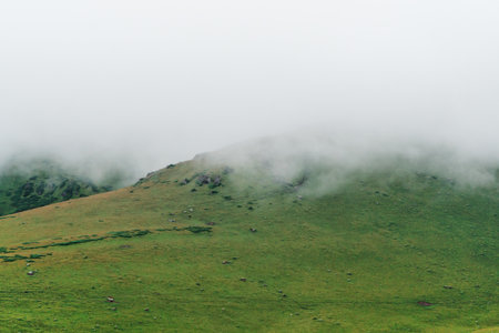 The hazy autumn scenery of mountainous areas amidst clouds and mist