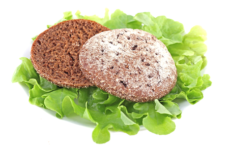 fresh salad leaves and breadの写真素材