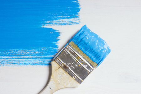Brush with blue paintの写真素材