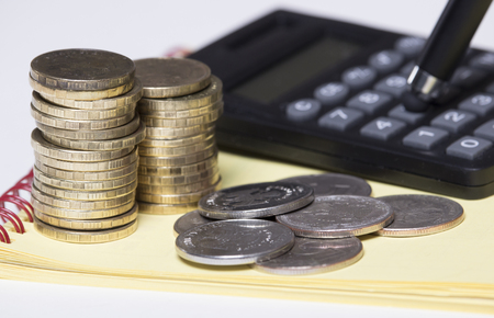 money, calculator and penの写真素材