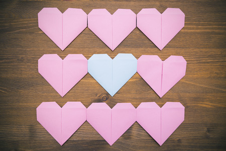 paper heart on wood backgroundの写真素材