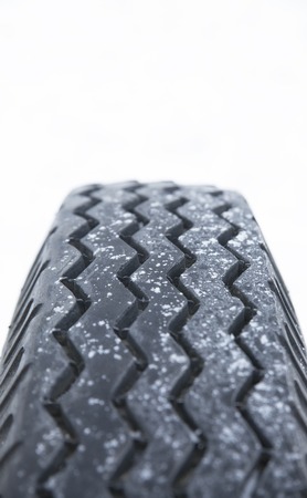 Car wheel in snowの写真素材