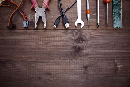 tools on a wooden tableの写真素材