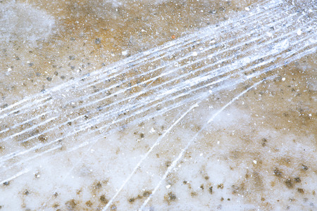 Scrape the ice by studded tiresの写真素材