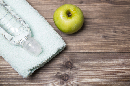 Towel, water and appleの写真素材