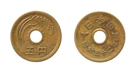 Japanese coin close up on a white background.