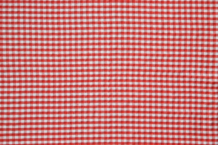 It is red a white tablecloth close up.の写真素材