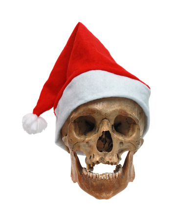 Skull of the person in a Christmas hatの写真素材