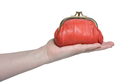 Full red wallet and female hand on a white background.の写真素材