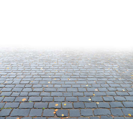 Abstract background. Old cobblestone pavement close-up.の写真素材