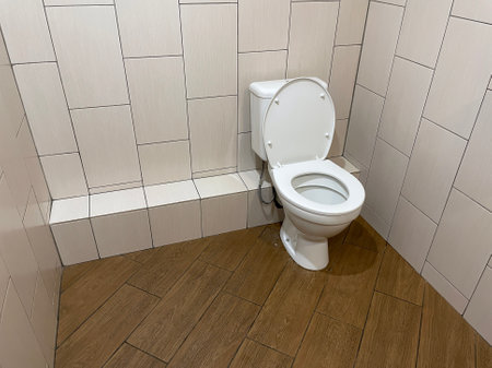 White toilet bowl in a public restroomの写真素材