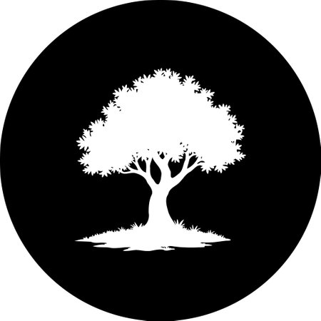 A white tree silhouette against a solid black circle creates a simple and elegant graphic. The design evokes feelings of nature, peace, and growth in a minimalist composition.のイラスト素材