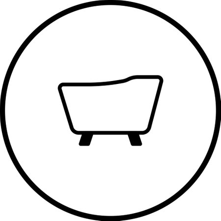 A minimalist bathtub icon in a circular frame. Perfect for bathroom designs and spa promotions.のイラスト素材
