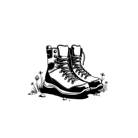 A hand-drawn illustration of hiking boots, perfect for illustrating outdoor adventures. The monochrome artwork gives a clean and versatile graphic element.のイラスト素材