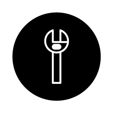 A minimalist illustration features a white wrench tool centered in a bold black circle, symbolizing simplicity and industrial design. Ideal for technical or repair-themed graphics.のイラスト素材