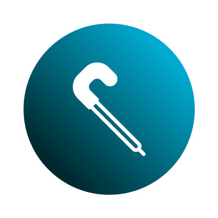 A simple illustration of a white candy cane icon inside a blue circle, perfect for winter and holiday themes.のイラスト素材