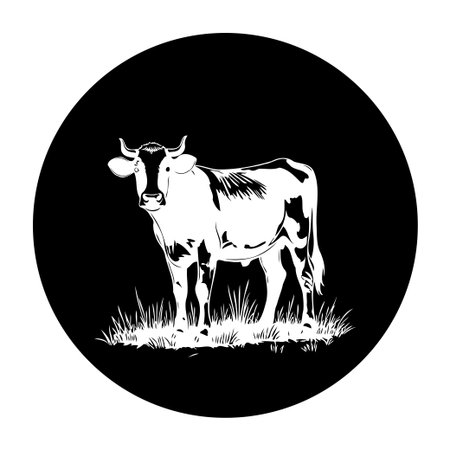 A monochrome illustration of a cow standing in grass. The design features a classic cow silhouette in black and white, suitable for various creative applications.のイラスト素材