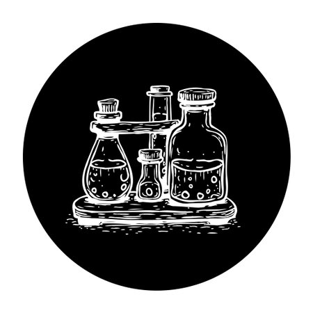 A minimalist chemistry set illustration in black and white. The vintage alchemy style highlights science with a touch of mystery and wonder.のイラスト素材