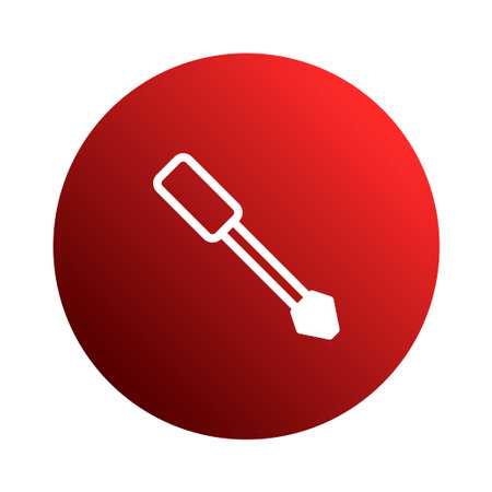 A white screwdriver icon centered on a red circle background, symbolizing tools, repair services, and construction-related themes. This graphic is simple, clean, and visually appealing.のイラスト素材