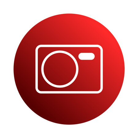 A simple camera icon within a red circle. The design represents photography and is suitable for applications related to capturing images, design, or visual communication.のイラスト素材