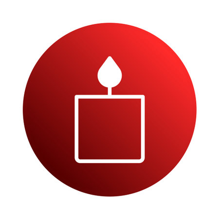 A simple candle icon with a flame on a red gradient circle background. This graphic element is perfect for adding warmth and peaceful atmosphere.のイラスト素材