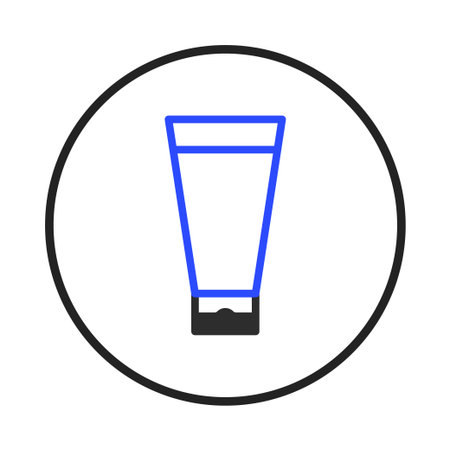 A minimalist illustration features a tube with a blue outline and a black base, likely representing cream or lotion, set within a clean, circular frame. Ideal for skincare, beauty, or personal careのイラスト素材