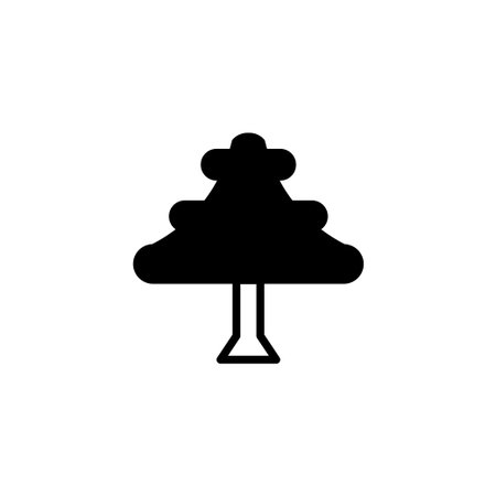 Elegant and simple tree silhouette icon perfect for projects needing a touch of natural or festive design. This clean vector illustration features a black evergreen tree shape, ideal for logos,のイラスト素材